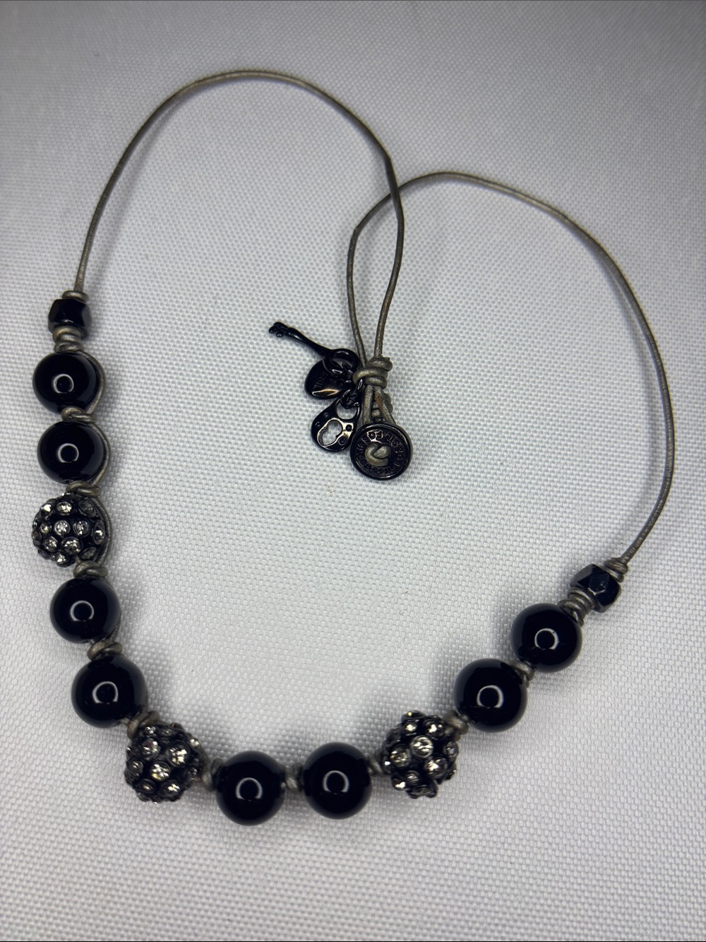 Fossil beaded dainty dark coloured necklace
